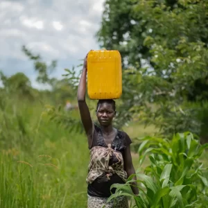 Walking-long-distances-to-collect-water-from-very-unsafe-areas-put-many-teenage-girls-in-the-path-of-danger.